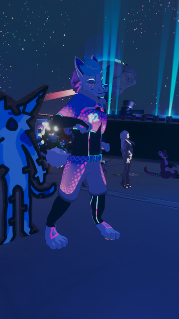 Me dancing at Club FYNN with a happy expression. Right behind me there's a friend using an avatar of a cardboard cutout of a scrungle FYNN.